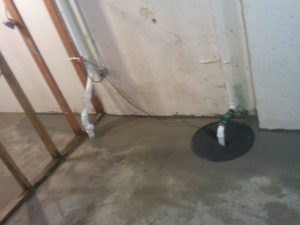 This basement was literally a muddy wet mess before we installed drain tile and a sump pump and pit